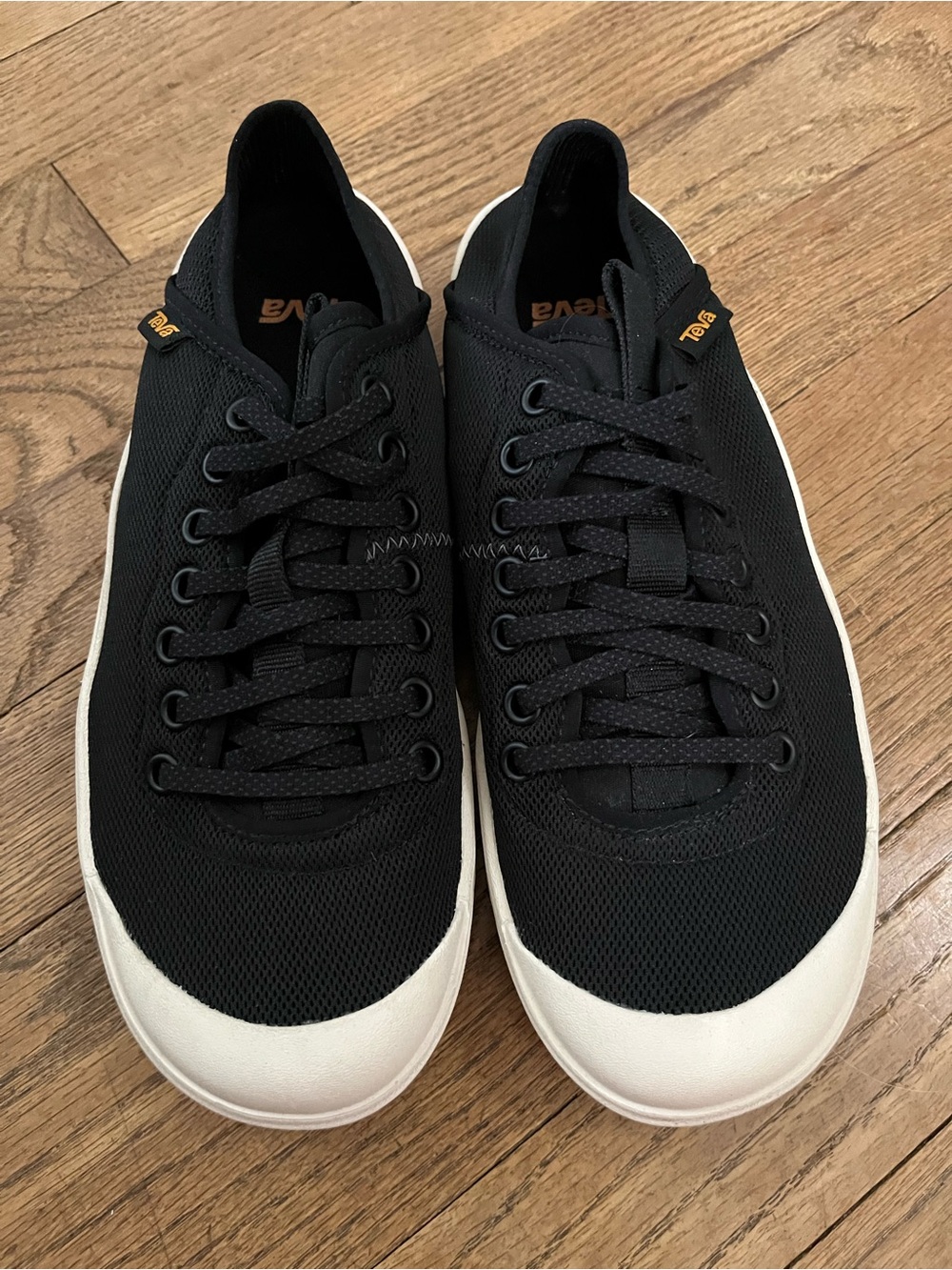 Teva Black Sneakers with White Toe Cap and Orange Logo Tabs